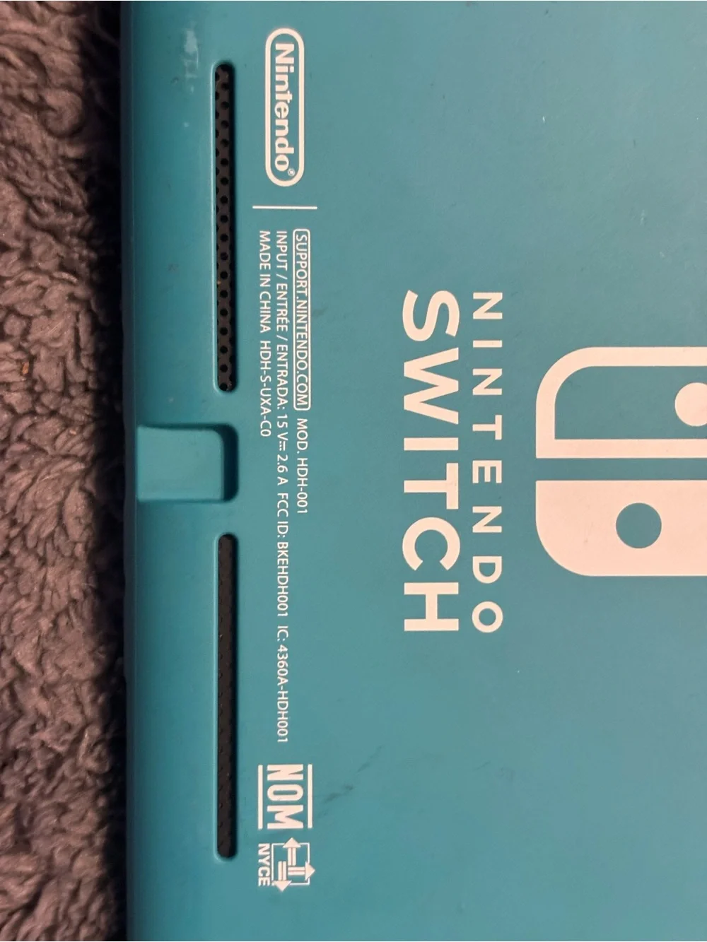 Nintendo Turquoise Handheld Gaming Console